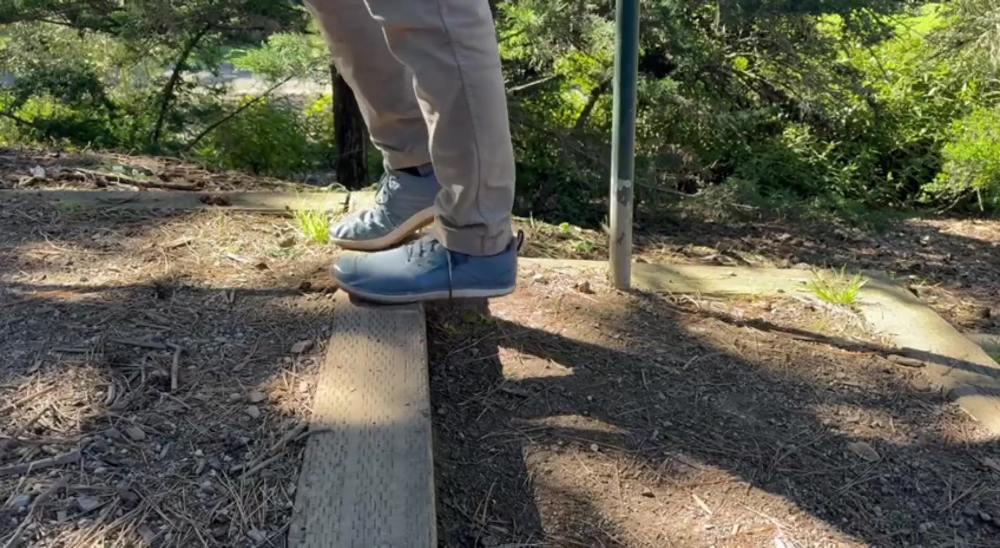 Feet stepping down outdoors