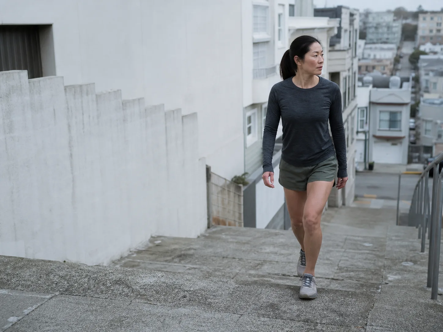 A woman walking up a San Francisco hillside
